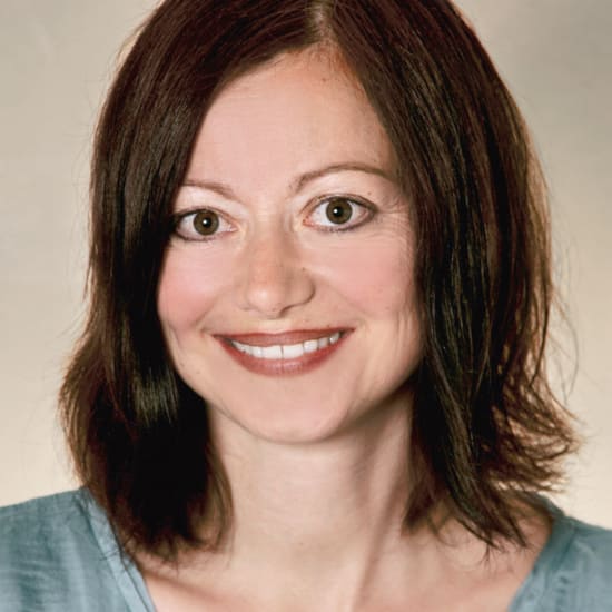 Atmospheric portrait photo of a smiling person