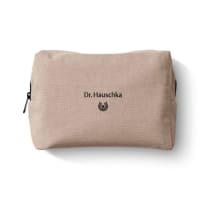 Dunkle altrosa Kosmetiktasche mit Schriftzug Dr. Hauschka Naturkosmetik