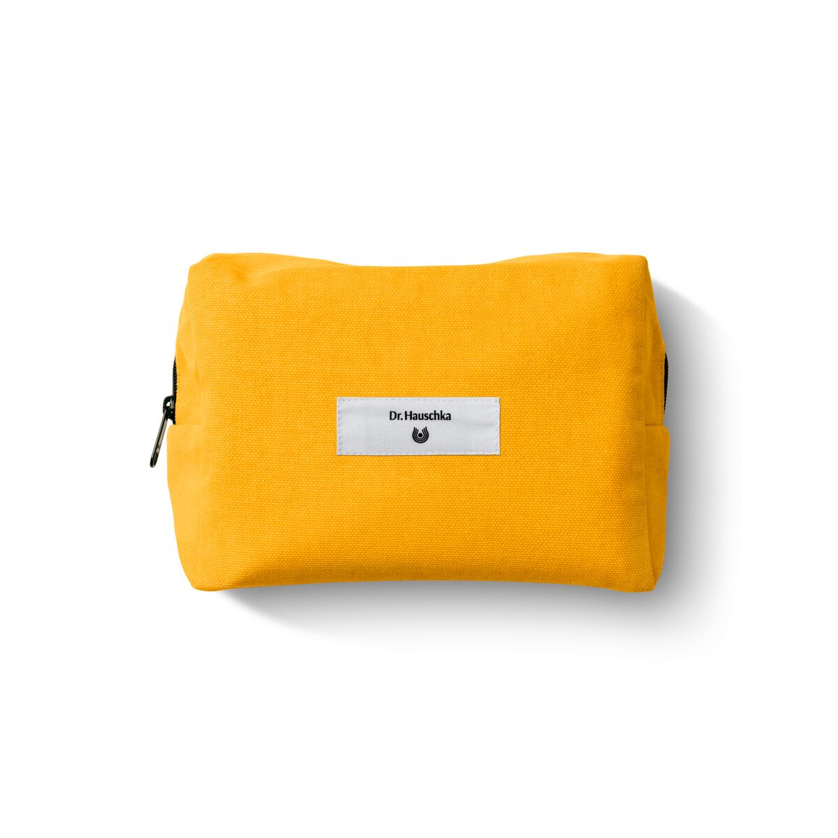 Gelbe Kosmetiktasche mit Label Dr. Hauschka Naturkosmetik