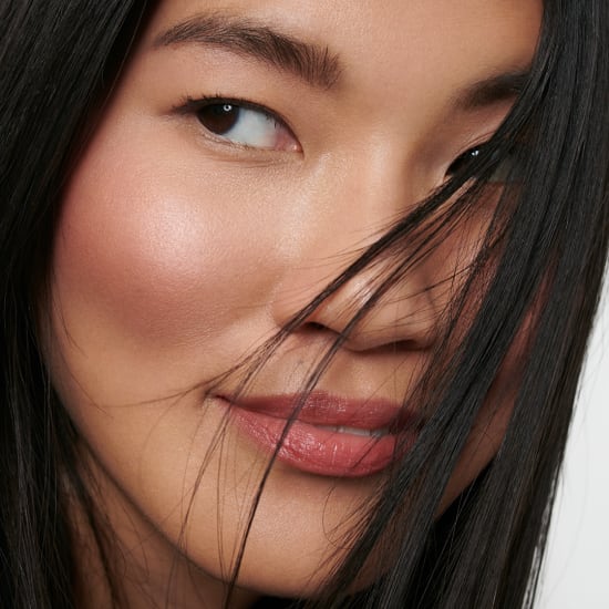 Atmospheric image of one person with glowing makeup