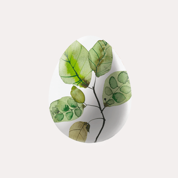 Osterei mit Aquarellblättern, symbolisiert natürliche Werte von Dr. Hauschka Naturkosmetik